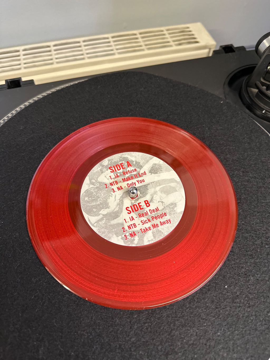 Three-way split on red 7-inch vinyl