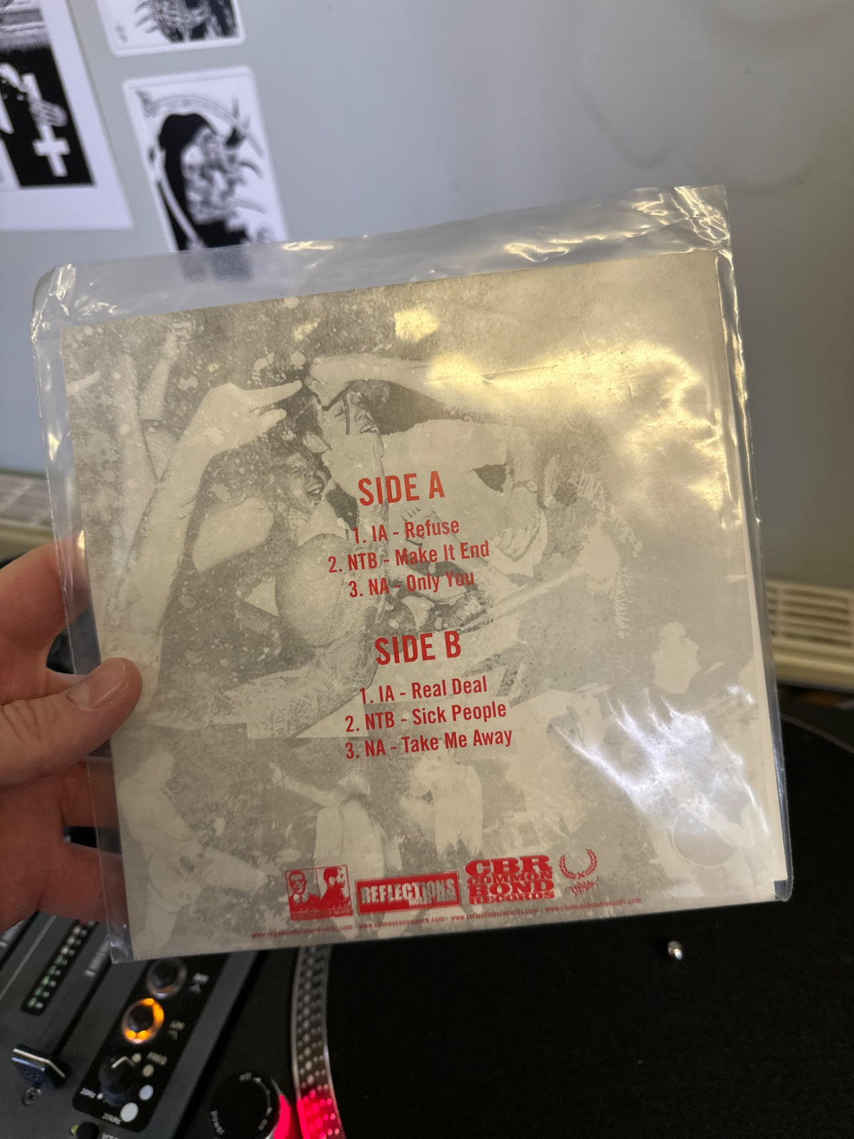 Three-way split rear sleeve and track listing
