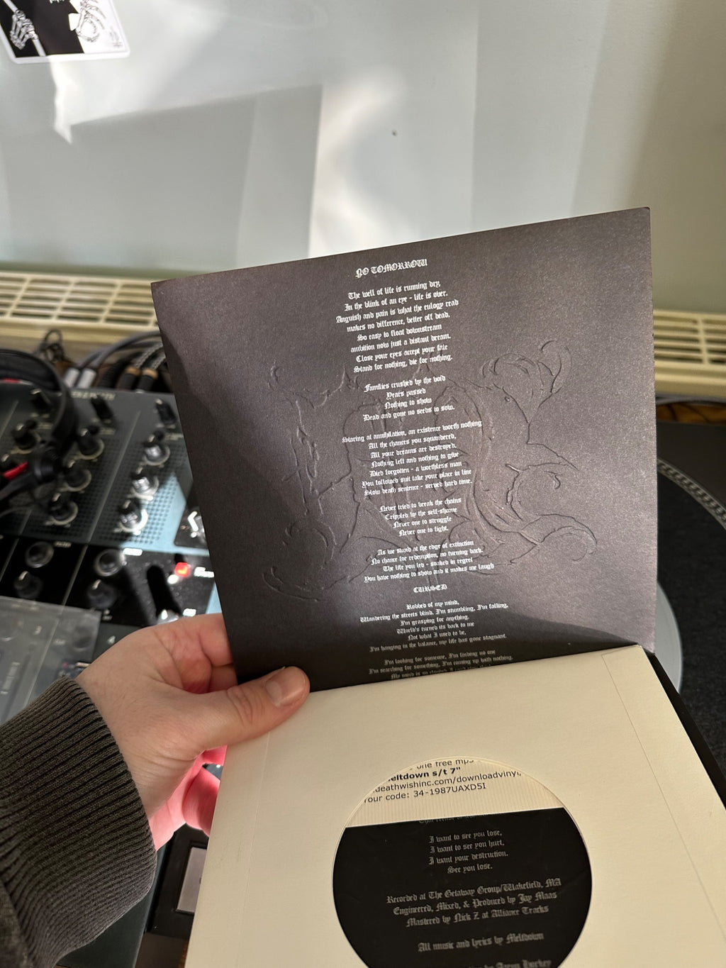 Meltdown inner sleeve and lyrics
