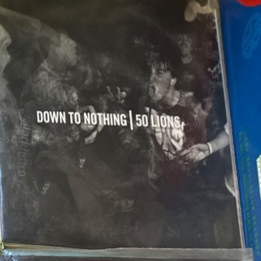Actual sleeve: Down to Nothing / 50 Lions — Split EP 7-inch