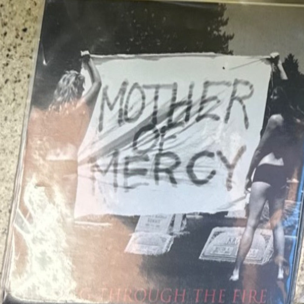 Actual sleeve: Mother Mercy — Through the Fire 7-inch